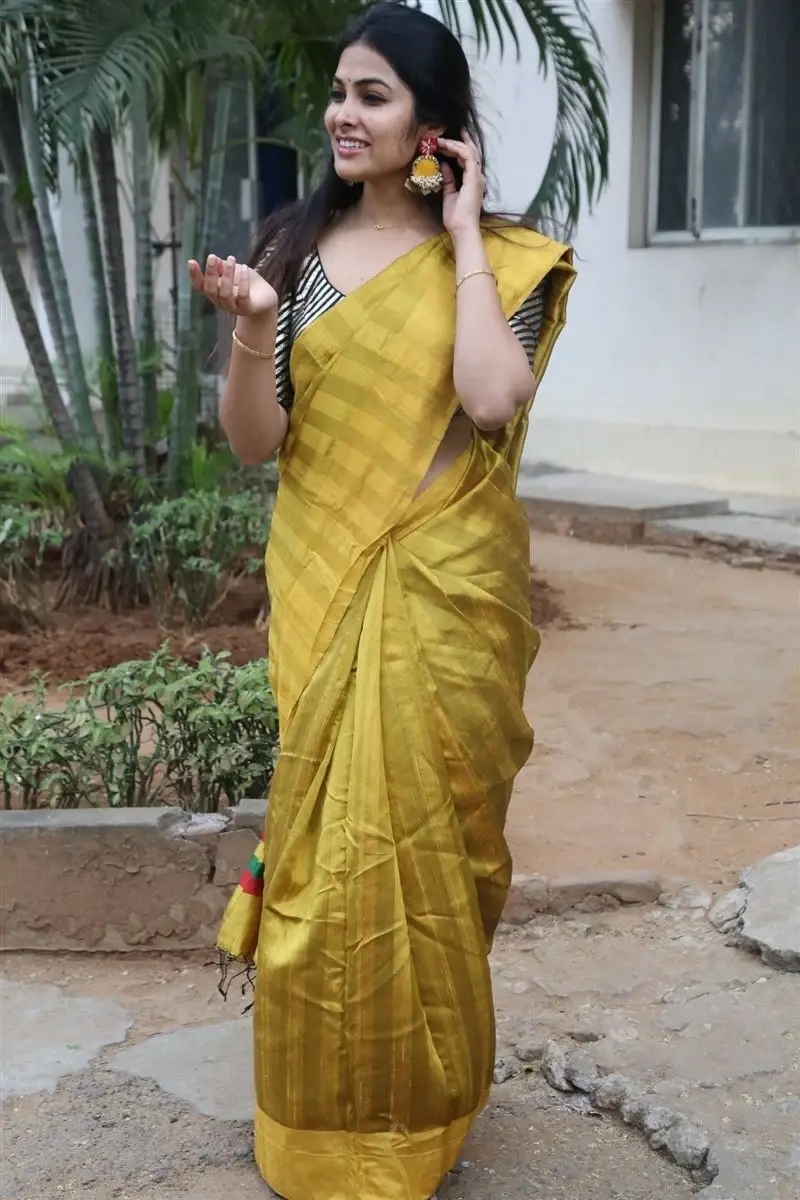 ACTRESS DIVI VADTHYA IN YELLOW SAREE AT LAMBASINGI MOVIE MEET 8